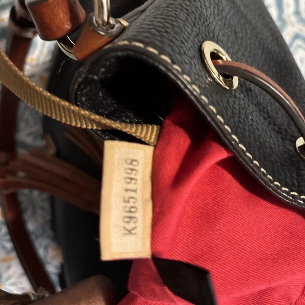 Dooney & Bourke Black Pebbled Leather Drawstring Bucket Bag with Brown Trim - Picture 11 of 11